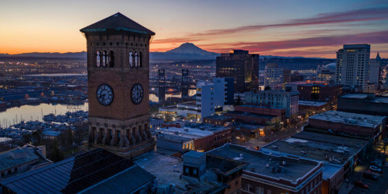 Image of the old Tacoma city hall and downtown Tacoma at night