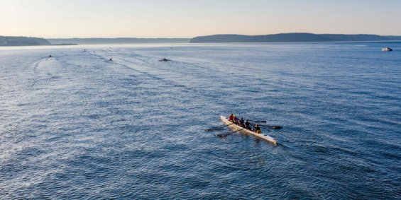 A large number of people kayaking and utilizing the water in Tacoma